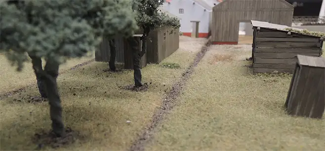 Diorama limburgs museum romein middeleeuwen monnik huis landschap modelbouw sfeer